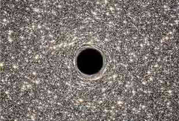 Artist's View of M60-UCD1 Black Hole Image Credit: NASA, ESA, STScI-RCC14-41a.